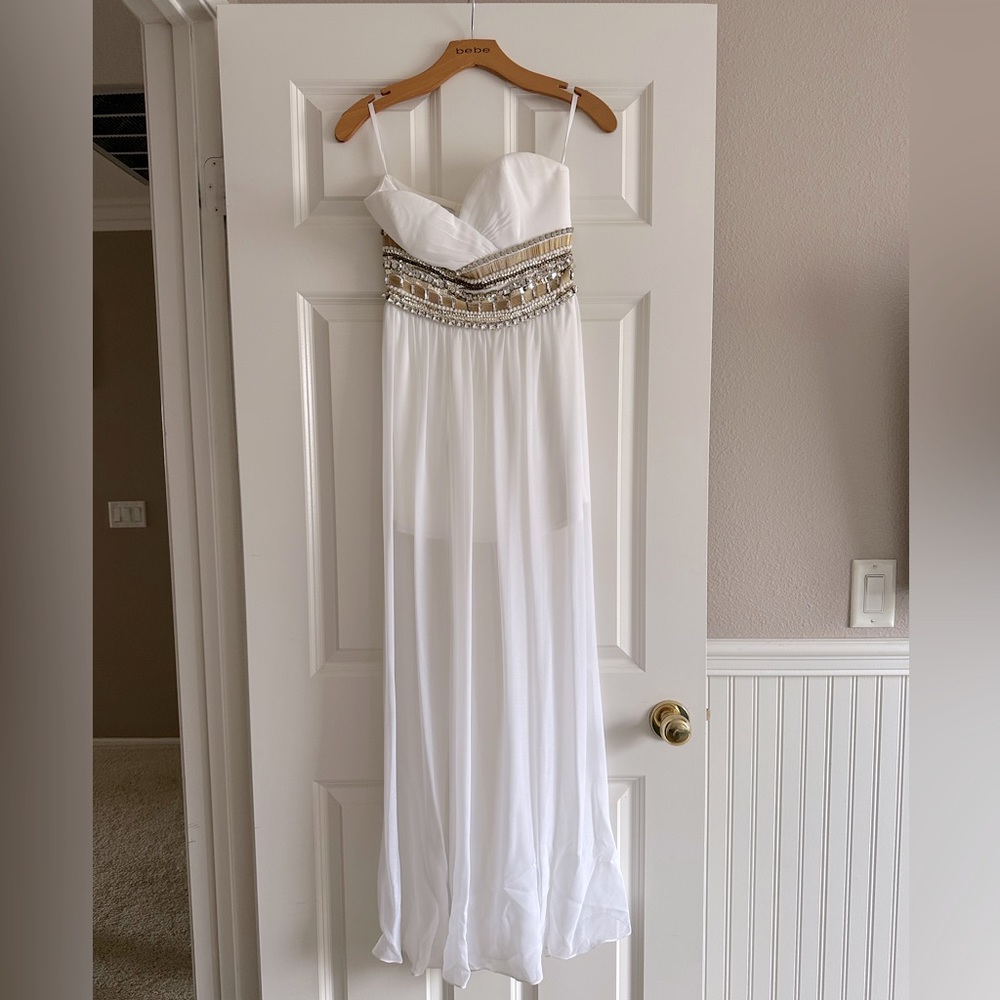 Pre-Loved and excellent condition Bebe evening gown size 0.